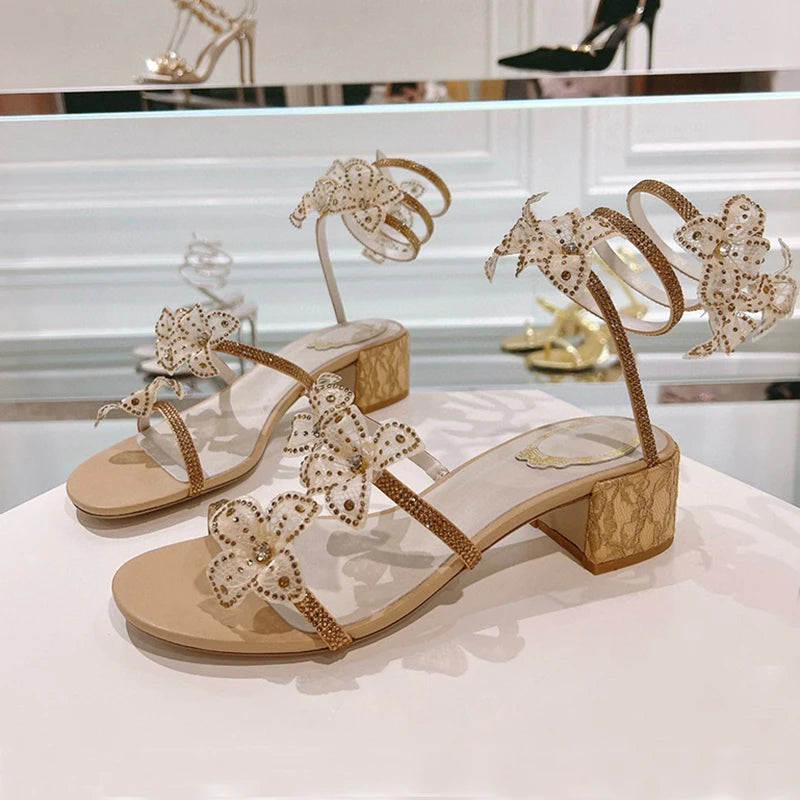 Women's rhinestone square heel sandals by MAIRA'S COLLECTIONS featuring glittering rhinestones and stylish square heels.