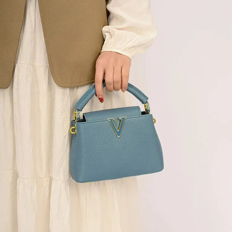 Women's luxury leather crossbody bag by MAIRA'S COLLECTIONS, featuring a sleek design and adjustable strap in the image.