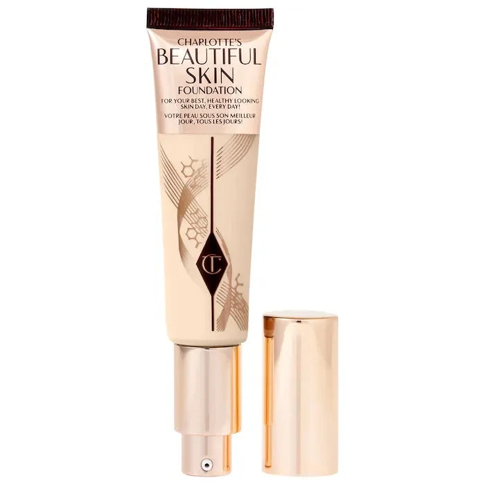 MAIRA'S COLLECTIONS CT Starlight Liquid Flawless Glow Primer bottle with a sleek design and shimmering finish.