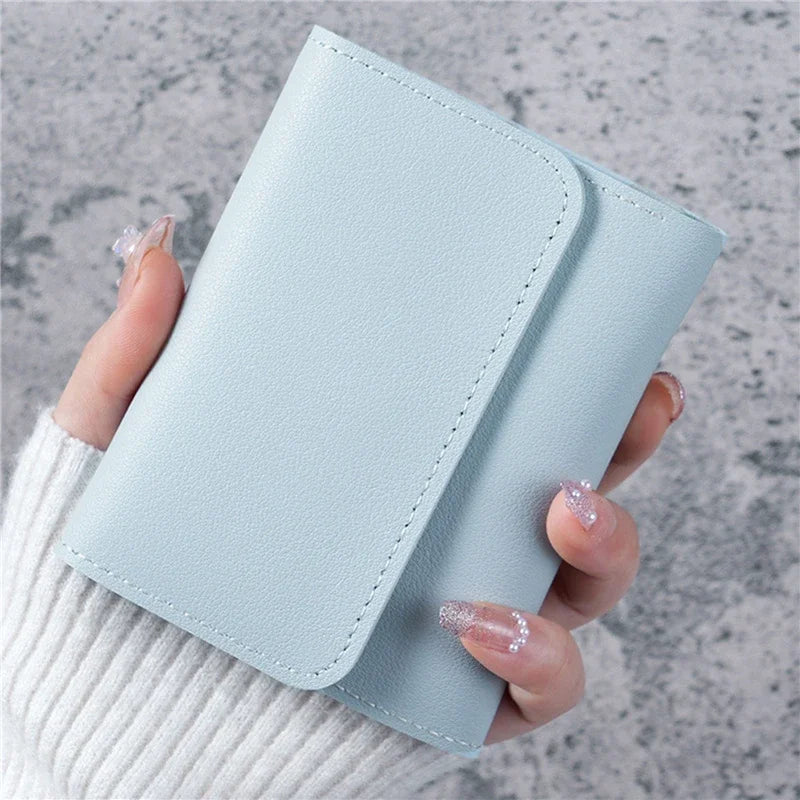 Women's small PU leather wallet by MAIRA'S COLLECTIONS featuring a sleek design with multiple card slots and a coin pocket.