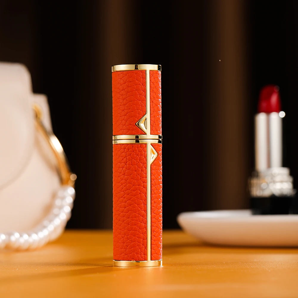 MAIRA'S COLLECTIONS Louischanzl 5ml refillable perfume atomizer bottle for travel, shown with sleek transparent design and spray nozzle.