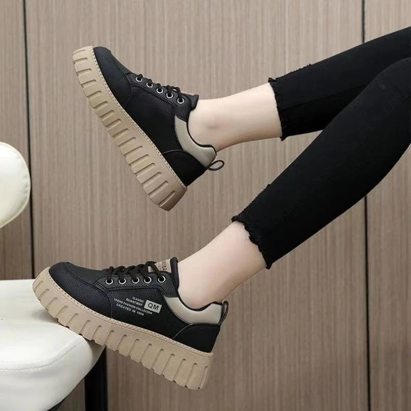 Women's white platform sneakers with thick soles from MAIRA'S COLLECTIONS, showcasing casual style and comfortable design.