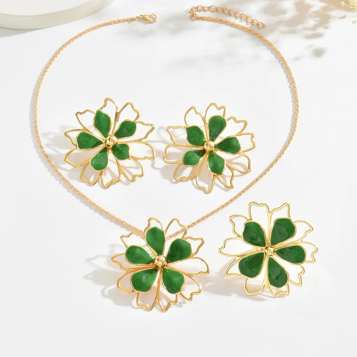 Bohemian floral jewelry set by MAIRA'S COLLECTIONS featuring intricate floral design in gold and colorful beads.