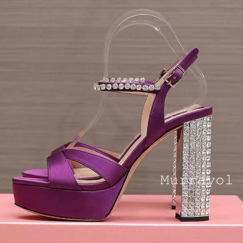 Women's satin high heel sandals with rhinestone embellishments and platform design, perfect for parties and formal events.