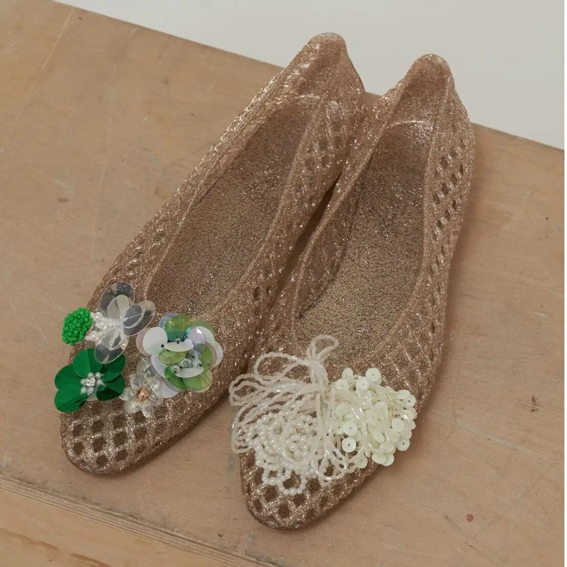 Women's Crystal Jelly Flats from MAIRA'S COLLECTIONS featuring pointed toe summer sandals with transparent jelly material and decorative crystals.