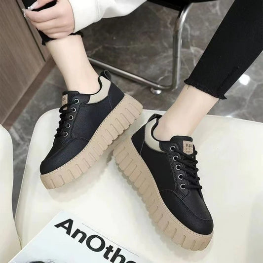 Women's white platform sneakers with thick soles and casual style from MAIRA'S COLLECTIONS, featuring lace-up design and cushioned insoles.