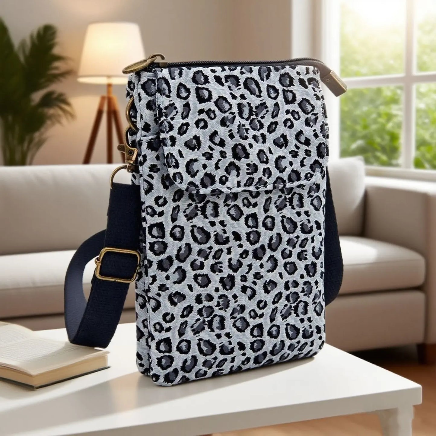 Women's printed crossbody phone bag by MAIRA'S COLLECTIONS featuring a colorful floral design and adjustable strap.