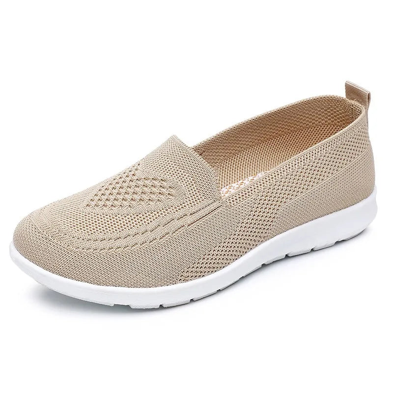 Women's casual walking shoes by MAIRA'S COLLECTIONS with breathable fabric and soft, comfortable design, shown in a stylish profile view.