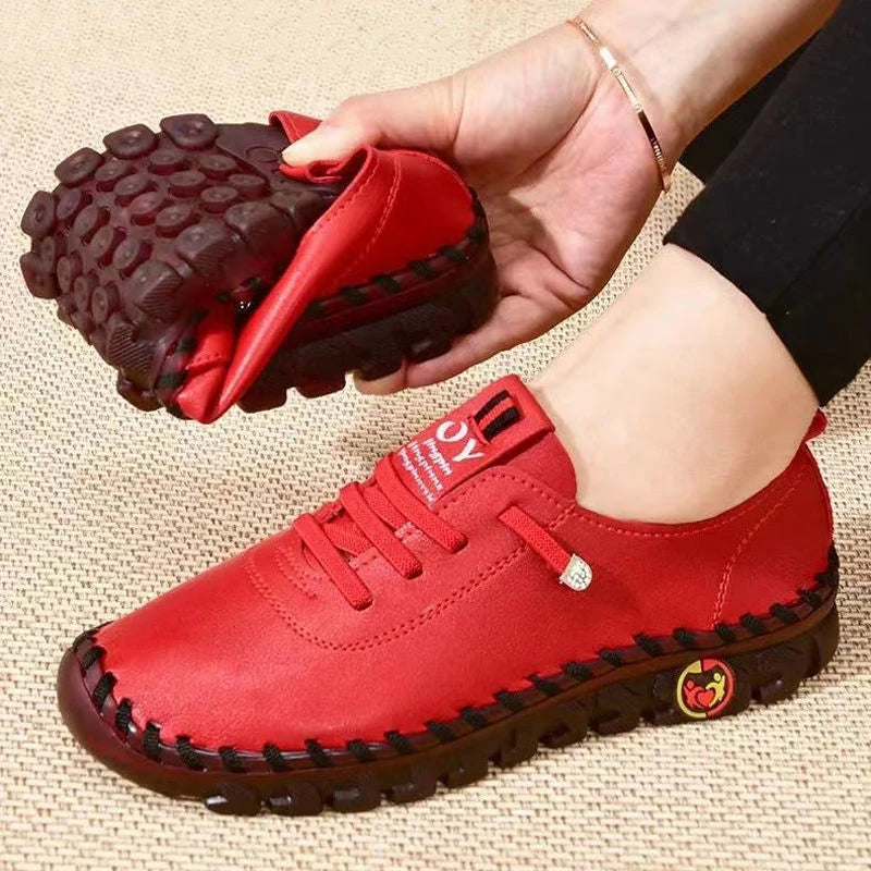 Women's leather sneakers by MAIRA'S COLLECTIONS, lace-up casual shoes with comfortable design and stylish appearance.