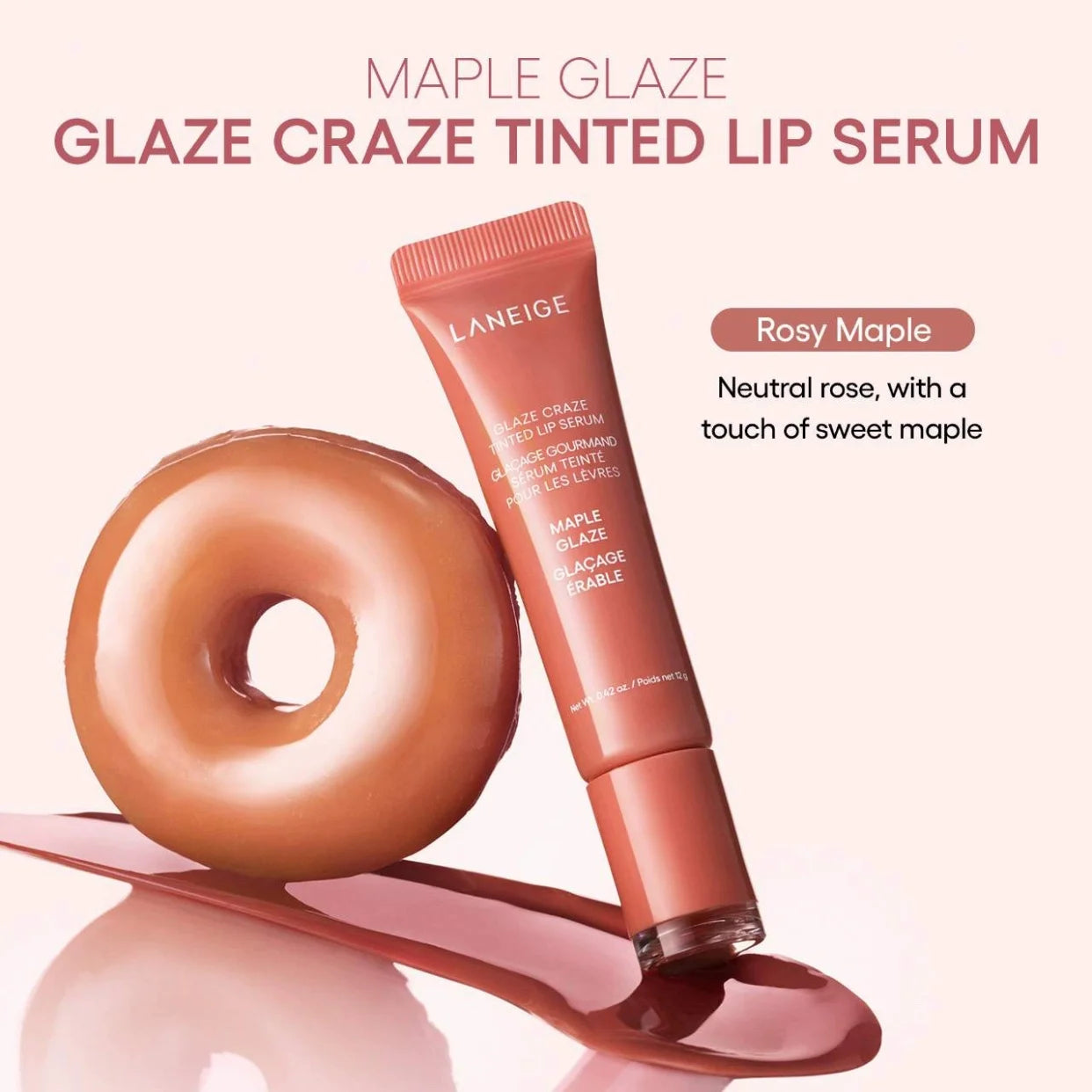 MAIRA'S COLLECTIONS donut-shaped lip oil with strawberry, raspberry, and chocolate scents, featuring a glossy, colorful lip balm.