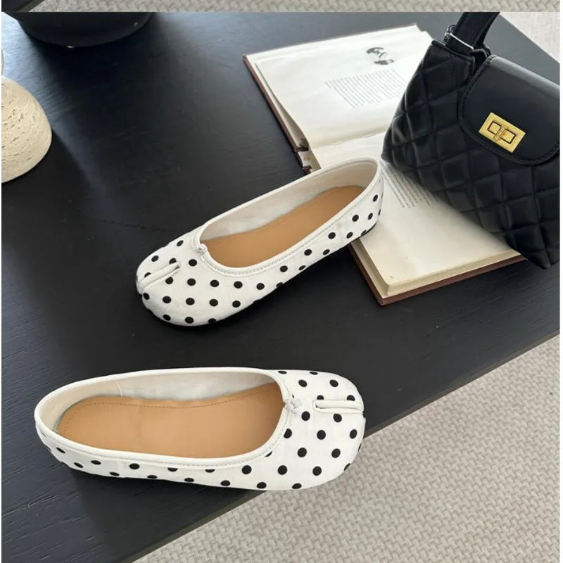 Women's polka dot Tabi flats by MAIRA'S COLLECTIONS with split toe design, showcasing stylish ballerina shoes with a playful pattern.