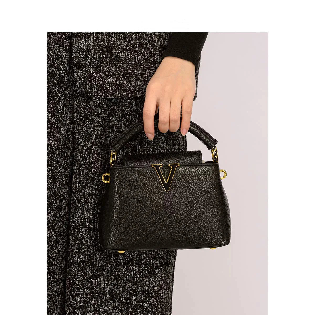 Women's luxury leather crossbody bag by MAIRA'S COLLECTIONS, featuring sleek design and high-quality craftsmanship.
