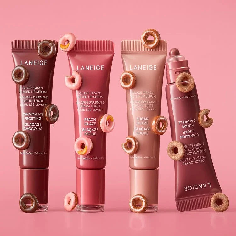 MAIRA'S COLLECTIONS Donut Lip Oil with strawberry, raspberry, and chocolate scents, featuring a cute donut-shaped container.