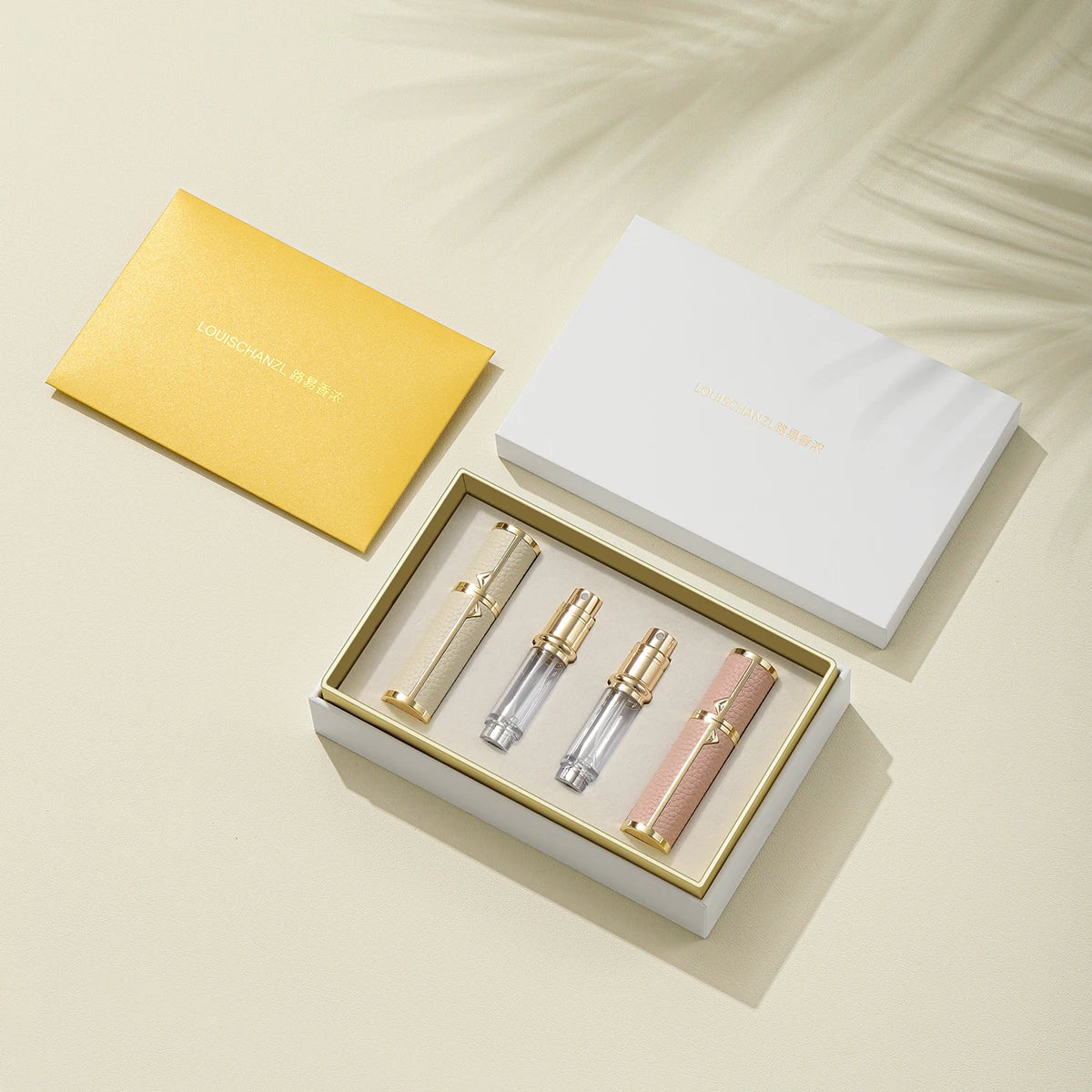 MAIRA'S COLLECTIONS Louischanzl refillable perfume atomizer bottle, 5ml travel spray, with sleek design and transparent container.