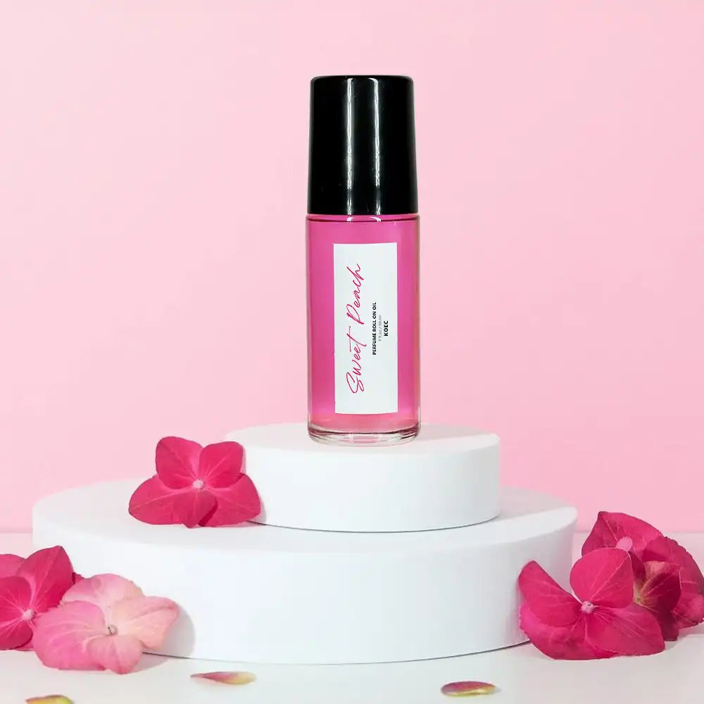30ml MAIRA'S COLLECTIONS Sweet Peach fragrance roll-on oil with jasmine and musk, nourishing and long-lasting natural scent.