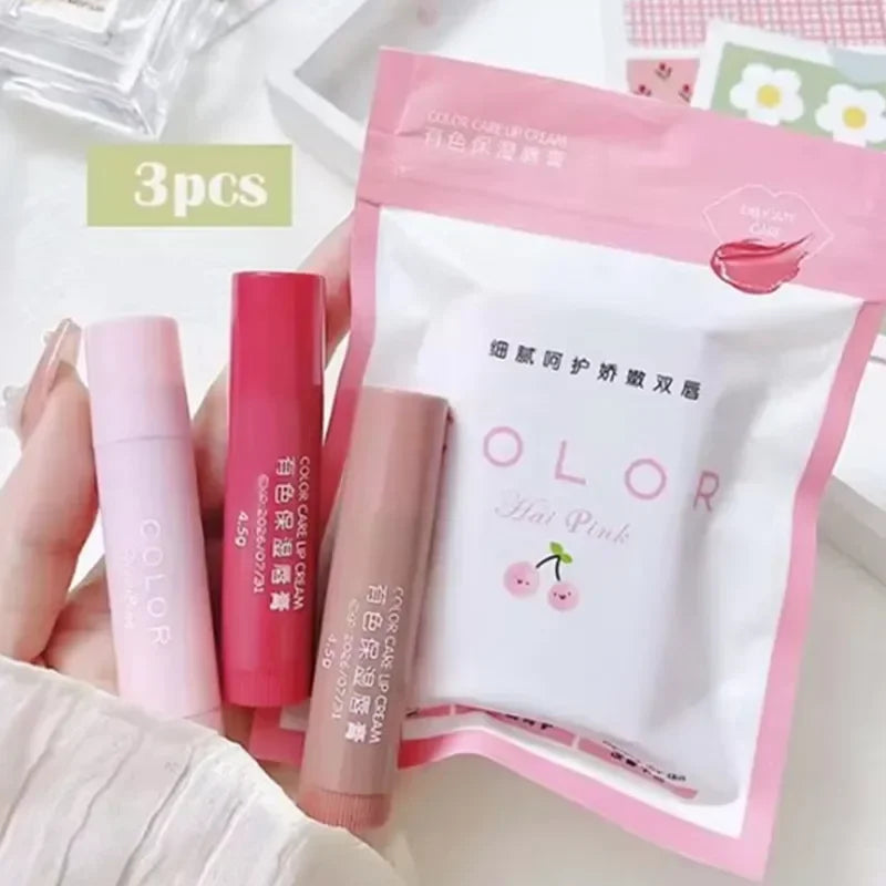 MAIRA'S COLLECTIONS moisturizing lip balm with lip glaze, smooth texture, in a sleek container, perfect for hydrating lips.